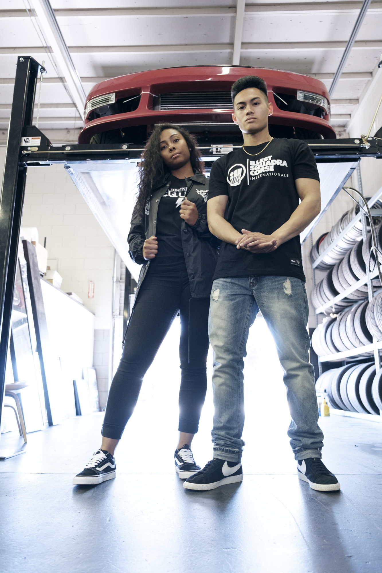 Model Noel and Eryka in a garage setting